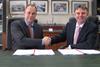 Western Ferries’ managing director, Gordon Ross signs the contract with Cammell Laird’s chief executive, John Syvret