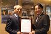 LR's Senior Inspector Hideo Natsui (left) presented the AiP to Tsuneishi Shipbuilding's Shipbuilding Sales Department Manager Keiichiro Sho (right) on 30 March.
