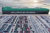 Wallenius Wilhelmsen PCTC at port with rows of cargo