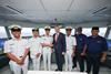 The image shows the inauguration of the Wärtsilä simulation suite at ALAM