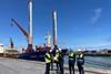 The image shows the Onego Deusto equipped with its new eSAILs moored at the Bilbao quayside