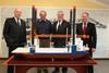 Berthold Brinkmann, receiver, Peter Bunschoten, staff director technical department Van Oord, Frank Horch, Hamburg‘s Minister of Economy, Transport and Innovation, Rüdiger Fuchs, agent of the receiver with a model of the ordered  offshore wind p...
