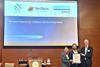 Elisa Woodward, non-executive director of SeaTech Solutions (Australia) and Nick Bentley, managing director of Oceania Marine Energy, being presented with the AiP by Jonathan Abrahams, head of maritime advisory (ANZ & India) DNV at the Ammonia Energy APAC