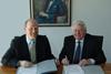 Prof Dr Gerhard Jensen, managing director Schottel Group, (left), and David Borthwick, managing director of Stone Marine Services, sign the agreement between the two companies