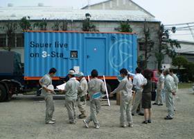 Live presentation of the 3-stage air-cooled compressors at a shipyard in Kobe, Japan, in 2008.