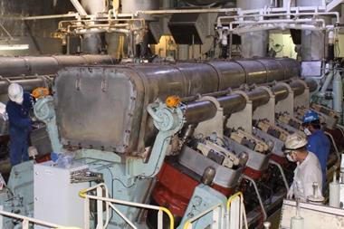 Goltens technicians disassembling a Wartsila 12V50DF
