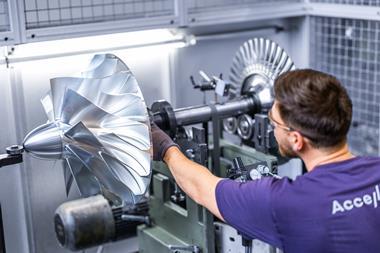 Man building an Accelleron turbocharger