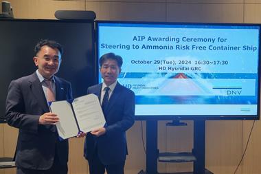 Representatives of DNV and HHI at an AiP ceremony for an ammonia-fuelled container ship