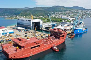 The arrival of the Polish-built hull of Nexans Aurora in Ulsteinvik for equipment and machinery installation and outfitting. (Credit: Nexans).