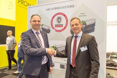 Rik De Petter, marine & offshore chief executive, Bureau Veritas Belgium & Luxembourg (left) hands over approval and certification to Tim Berckmoes, CEO of Anglo Belgian Corporation