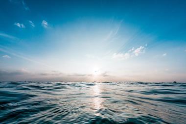 seascape with blue sky and sun