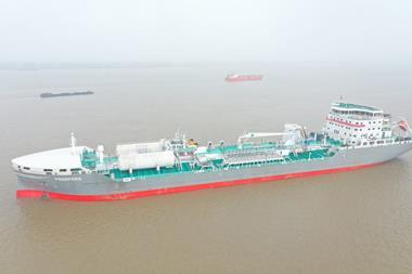Chinese-built Prospero, with funnel on deck for passage under Nanjing Bridge on the Yangtze.