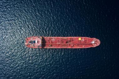 Image of a red tanker at sea