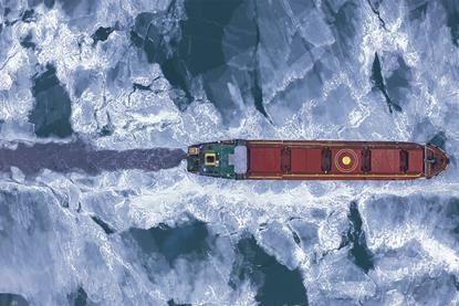 Cargo ship in the sea at winter time
