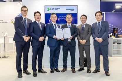 Representatives from DNV and HMD at an AiP awarding ceremony