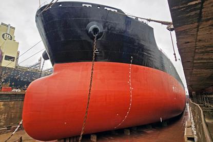 A red and black hull coated with Nippon Paint Marine hull coating