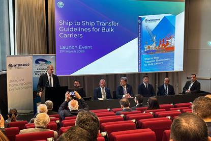 Representatives from INTERCARGO discussing dry bulk ship-to-ship transfer guidelines at an event in Athens