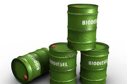 four green cans with biodiesel written on them