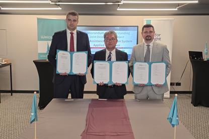 Employees of LR, K Shipbuilding and Liberian Registry at an MoU signing to develop wind propulsion for MR tankers