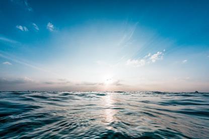 seascape with blue sky and sun