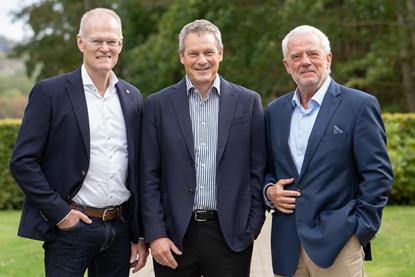 The image shows Kim Bengtsen, Henrik Sørensen and Søren Ø. Sørensen smiling at the camera