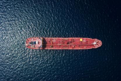 Image of a red tanker at sea