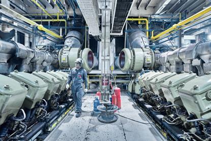 ABB Turbocharging engineers conducting service and maintenance work in a power plant
