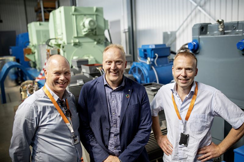 Project leaders Egil Hystad (left) and Kjell Storelid (right) of Wärtsilä flank Willy Wågen of the Sustainable Energy Catapult Centre at its test facility at Stord, Norway.