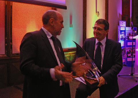 Houlder receives the Spirit of Innovation award from Mercator Media MD Andrew Webster at the Seawork awards dinner