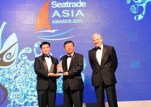 Mr. Noboru Ueda (center), chairman and president, ClassNK, receiving the ‘classification society award’ at the Seatrade Asia Awards ceremony from Mr. Francis Liu (left) deputy director of marine, marine department, government of Hong Kong Specia...
