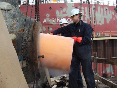 Installing Thordon's seawater lubricated propeller shaft bearing replacing metal bearing and oil