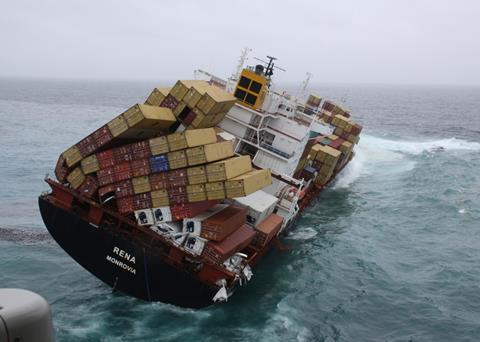 Rena losing containers as heavy swells wash her deck on the starboard side. Image: Mark Alen