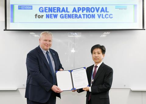 Seung Ho Jeon, Executive Vice President of HHI receiving the GASA certificate from Vidar Dolonen, DNV GL Regional Manager for Korea & Japan. (credit: DNV GL)