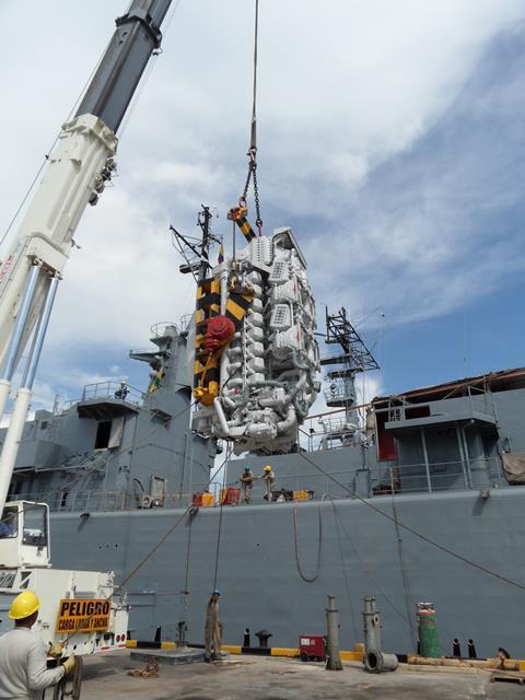 One of the new MTU 1163 TB 73L is craned onboard a Colombian navy frigate