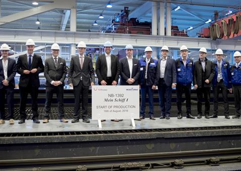 Delegates from Meyer Turku and TUI Cruises attend the steel cutting ceremony for the new 'Mein Schiff 1'