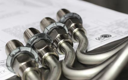 Giro has developed a wide range of ultra high pressure, common rail, fuel injection pipes, including sheathed fuel injection pipes (pictured). Credit: Heinzmann Group