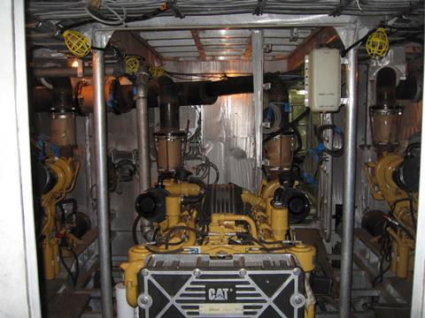 Three Caterpillar high speed diesels in a crewboat installation