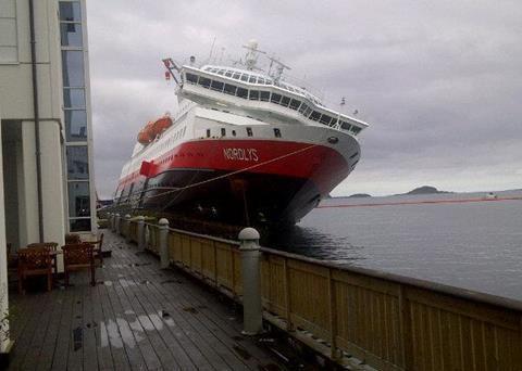 MS Nordlys lists heavily at the quayside at Ålesund