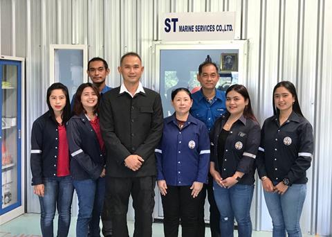 Worrakarn Wiranant (third right) and Pimpisa Thamsangsri (fourth right), S.T. Marine general manager, with other colleagues from S.T. Marine Photo: S.T. Marine