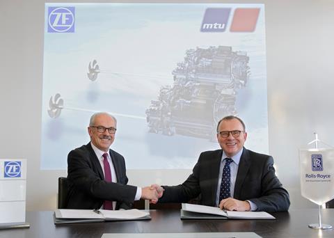 Ulrich Dohle (right), CEO of Rolls-Royce Power Systems and Wilhelm Rehm, board member of ZF, sign the collaboration agreement