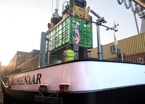 The <i>Alphenaar</i> is the first inland waterway vessel to use the zero-emissions service made possible by Wärtsilä’s battery container solution. (© Zero Emission Services)